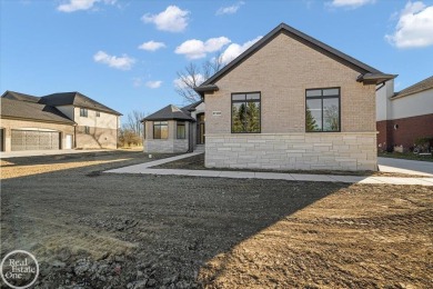 Quality luxury ranch featuring a modern and stylish design built on Copper Hills Golf and Country Club in Michigan - for sale on GolfHomes.com, golf home, golf lot