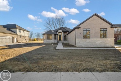 Quality luxury ranch featuring a modern and stylish design built on Copper Hills Golf and Country Club in Michigan - for sale on GolfHomes.com, golf home, golf lot