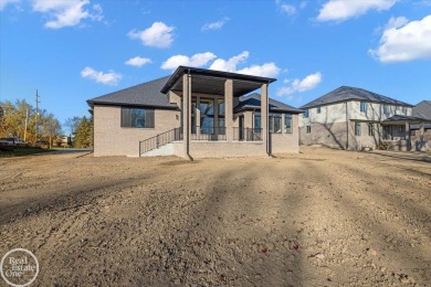 Quality luxury ranch featuring a modern and stylish design built on Copper Hills Golf and Country Club in Michigan - for sale on GolfHomes.com, golf home, golf lot