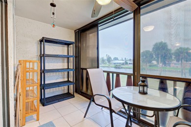 Water view condo on the second floor.  Riverhouse HOA is a on Rotonda Golf and Country Club The Hills Course in Florida - for sale on GolfHomes.com, golf home, golf lot