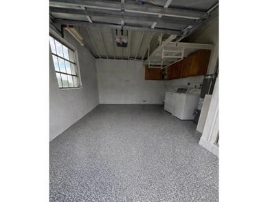 Beautifully remodeled 4-bedroom, 2-bath home located on a on Sunrise Lakes Phase III in Florida - for sale on GolfHomes.com, golf home, golf lot