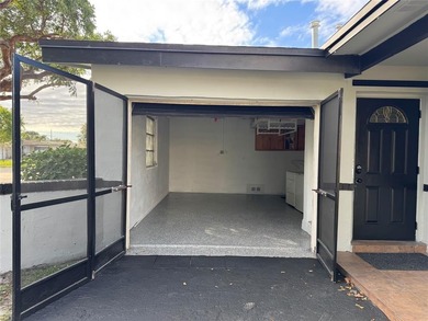 Beautifully remodeled 4-bedroom, 2-bath home located on a on Sunrise Lakes Phase III in Florida - for sale on GolfHomes.com, golf home, golf lot