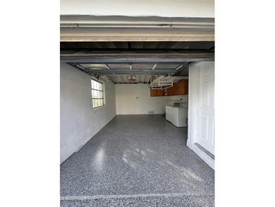 Beautifully remodeled 4-bedroom, 2-bath home located on a on Sunrise Lakes Phase III in Florida - for sale on GolfHomes.com, golf home, golf lot