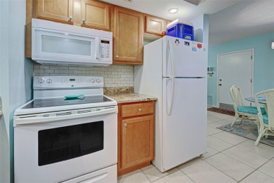 Water view condo on the second floor.  Riverhouse HOA is a on Rotonda Golf and Country Club The Hills Course in Florida - for sale on GolfHomes.com, golf home, golf lot