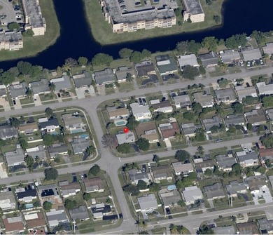 Beautifully remodeled 4-bedroom, 2-bath home located on a on Sunrise Lakes Phase III in Florida - for sale on GolfHomes.com, golf home, golf lot