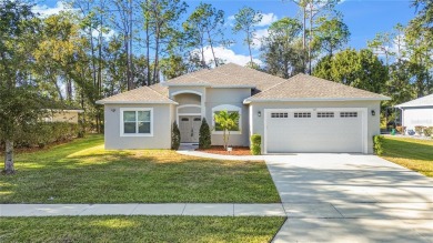 Welcome to your dream home in the Epping Forest at Lake on The Links of Lake Bernadette in Florida - for sale on GolfHomes.com, golf home, golf lot