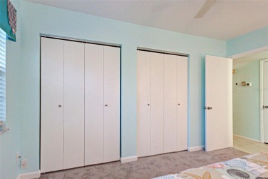 Water view condo on the second floor.  Riverhouse HOA is a on Rotonda Golf and Country Club The Hills Course in Florida - for sale on GolfHomes.com, golf home, golf lot
