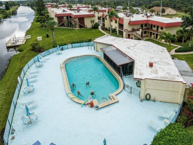 Water view condo on the second floor.  Riverhouse HOA is a on Rotonda Golf and Country Club The Hills Course in Florida - for sale on GolfHomes.com, golf home, golf lot