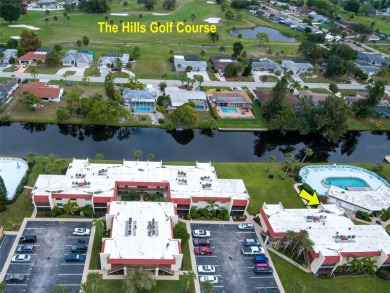 Water view condo on the second floor.  Riverhouse HOA is a on Rotonda Golf and Country Club The Hills Course in Florida - for sale on GolfHomes.com, golf home, golf lot