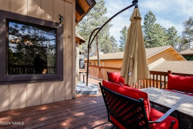 Beautiful 3 bedroom chalet nestled in the pines of Munds Park! on Pinewood Country Club in Arizona - for sale on GolfHomes.com, golf home, golf lot