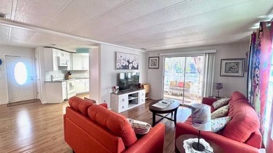 Welcome to this beautifully updated 2-bedroom, 2-bath on Riverbend Golf and Country Club in Florida - for sale on GolfHomes.com, golf home, golf lot