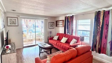Welcome to this beautifully updated 2-bedroom, 2-bath on Riverbend Golf and Country Club in Florida - for sale on GolfHomes.com, golf home, golf lot