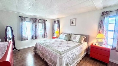 Welcome to this beautifully updated 2-bedroom, 2-bath on Riverbend Golf and Country Club in Florida - for sale on GolfHomes.com, golf home, golf lot