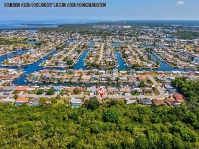 Live the Florida life in this waterfront community. Located in on Gulf Harbors Golf Course in Florida - for sale on GolfHomes.com, golf home, golf lot