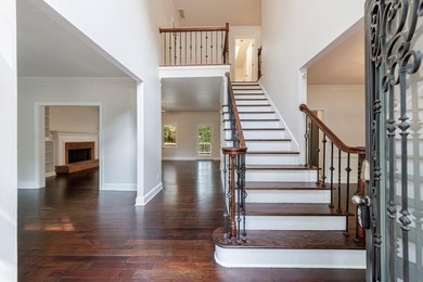 Nestled within prestigious Eagle Watch subdivision overlooking on Canongate At Eagle Watch Golf Club in Georgia - for sale on GolfHomes.com, golf home, golf lot