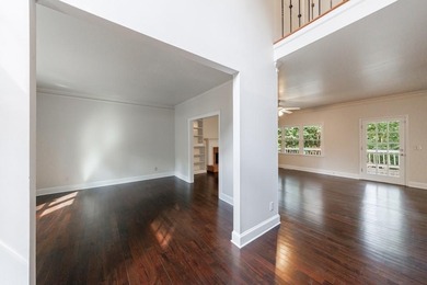 Nestled within prestigious Eagle Watch subdivision overlooking on Canongate At Eagle Watch Golf Club in Georgia - for sale on GolfHomes.com, golf home, golf lot