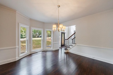 Nestled within prestigious Eagle Watch subdivision overlooking on Canongate At Eagle Watch Golf Club in Georgia - for sale on GolfHomes.com, golf home, golf lot