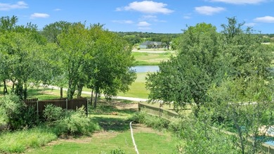 Set along the fairway of Lighthouse Country Club in the heart of on Packsaddle Country Club in Texas - for sale on GolfHomes.com, golf home, golf lot