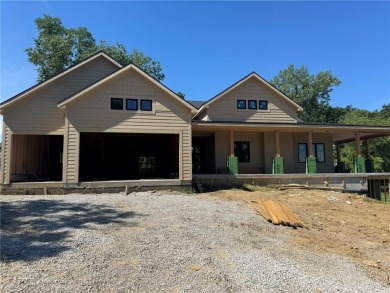 This uniquely custom-designed home at The National offers on The Deuce At the National Golf Club of Kansas City in Missouri - for sale on GolfHomes.com, golf home, golf lot