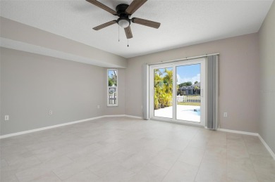 This stunning, newly renovated waterfront pool home in Southwest on Rotonda Golf and Country Club The Palms Course in Florida - for sale on GolfHomes.com, golf home, golf lot