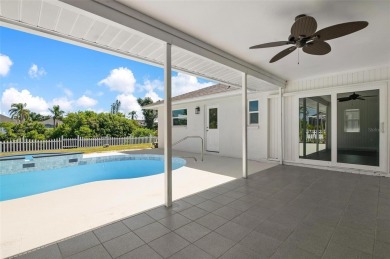 This stunning, newly renovated waterfront pool home in Southwest on Rotonda Golf and Country Club The Palms Course in Florida - for sale on GolfHomes.com, golf home, golf lot