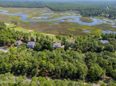 This exceptional home site is situated in the prestigious Rivers on Rivers Edge Golf Club in North Carolina - for sale on GolfHomes.com, golf home, golf lot