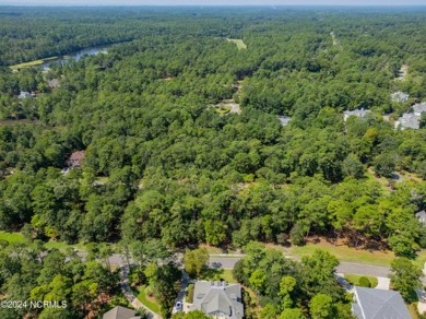 This exceptional home site is situated in the prestigious Rivers on Rivers Edge Golf Club in North Carolina - for sale on GolfHomes.com, golf home, golf lot