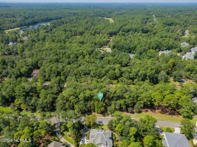 This exceptional home site is situated in the prestigious Rivers on Rivers Edge Golf Club in North Carolina - for sale on GolfHomes.com, golf home, golf lot