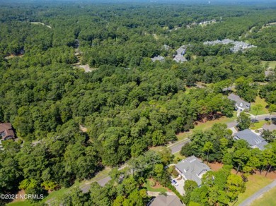 This exceptional home site is situated in the prestigious Rivers on Rivers Edge Golf Club in North Carolina - for sale on GolfHomes.com, golf home, golf lot