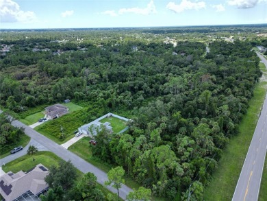 This vacant lot is tucked away in North Port, yet it's just on Bobcat Trail Golf Club in Florida - for sale on GolfHomes.com, golf home, golf lot