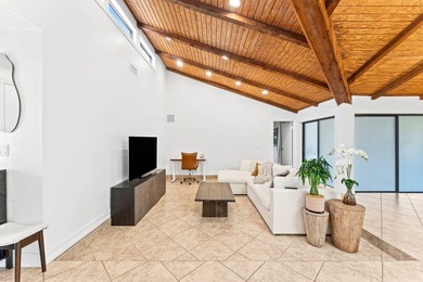 Welcome to this beautifully maintained 3-bedroom, 2-bathroom on Woodmont Country Club in Florida - for sale on GolfHomes.com, golf home, golf lot