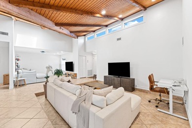 Welcome to this beautifully maintained 3-bedroom, 2-bathroom on Woodmont Country Club in Florida - for sale on GolfHomes.com, golf home, golf lot