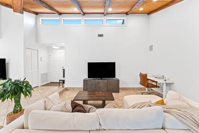 Welcome to this beautifully maintained 3-bedroom, 2-bathroom on Woodmont Country Club in Florida - for sale on GolfHomes.com, golf home, golf lot