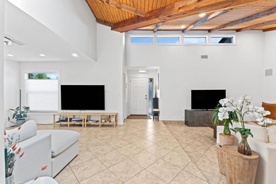 Welcome to this beautifully maintained 3-bedroom, 2-bathroom on Woodmont Country Club in Florida - for sale on GolfHomes.com, golf home, golf lot