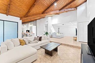 Welcome to this beautifully maintained 3-bedroom, 2-bathroom on Woodmont Country Club in Florida - for sale on GolfHomes.com, golf home, golf lot