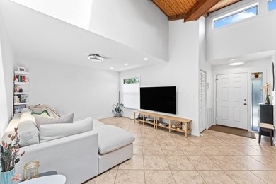 Welcome to this beautifully maintained 3-bedroom, 2-bathroom on Woodmont Country Club in Florida - for sale on GolfHomes.com, golf home, golf lot