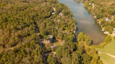 Lakefront Lot in Cherokee Village, ArkansasDon't miss this on Cherokee Village North Course in Arkansas - for sale on GolfHomes.com, golf home, golf lot