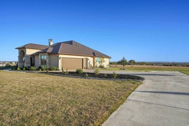 Discover the epitome of Hill Country  lakeside living in this on Palmer Lakeside At Barton Creek in Texas - for sale on GolfHomes.com, golf home, golf lot