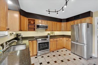 Welcome to your dream home! Nestled on a spacious, park-like lot on Greenbriar Hills Country Club in Missouri - for sale on GolfHomes.com, golf home, golf lot