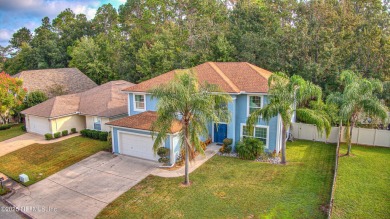 Welcome home to this two story charming home in the heart of on Golf Club At Fleming Island in Florida - for sale on GolfHomes.com, golf home, golf lot