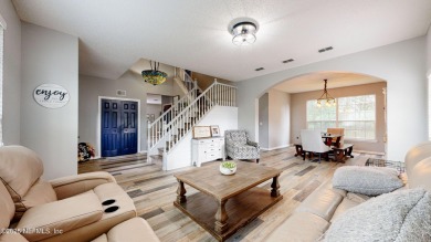 Welcome home to this two story charming home in the heart of on Golf Club At Fleming Island in Florida - for sale on GolfHomes.com, golf home, golf lot