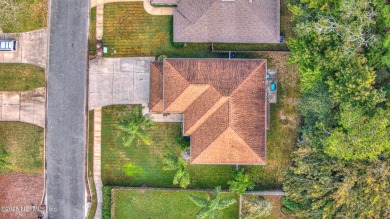 Welcome home to this two story charming home in the heart of on Golf Club At Fleming Island in Florida - for sale on GolfHomes.com, golf home, golf lot