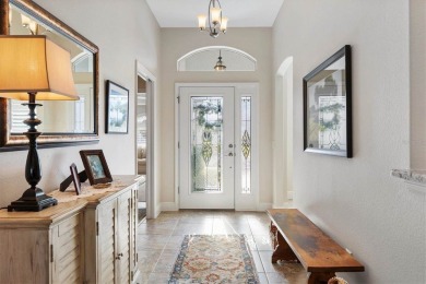 Welcome to this beautiful home where elegance meets comfort on Evans Prairie Golf and Country Club in Florida - for sale on GolfHomes.com, golf home, golf lot