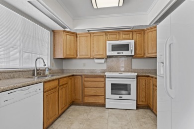 This perfect 2-bedroom 2-bath townhome that sits right next to on St. George Golf Course in Utah - for sale on GolfHomes.com, golf home, golf lot