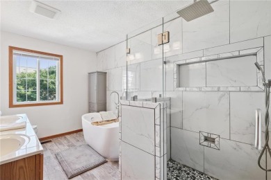 Fantastic end-unit townhome tucked into a prime Blaine location! on TPC of the Twin Cities in Minnesota - for sale on GolfHomes.com, golf home, golf lot