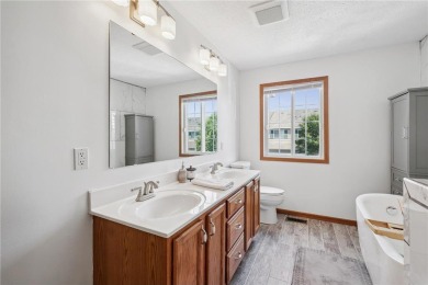 Fantastic end-unit townhome tucked into a prime Blaine location! on TPC of the Twin Cities in Minnesota - for sale on GolfHomes.com, golf home, golf lot