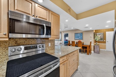 WATERFRONT Upscale custom renovation 2 BR/2b Condo. Breath on North Palm Beach Country Club in Florida - for sale on GolfHomes.com, golf home, golf lot