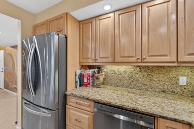 WATERFRONT Upscale custom renovation 2 BR/2b Condo. Breath on North Palm Beach Country Club in Florida - for sale on GolfHomes.com, golf home, golf lot