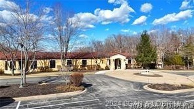 Looking to enjoy all the Lake of the Ozarks has to offer? Then on The Club At Porto Cima in Missouri - for sale on GolfHomes.com, golf home, golf lot