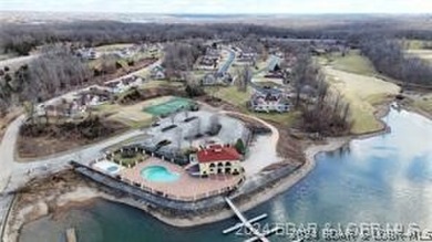 Looking to enjoy all the Lake of the Ozarks has to offer? Then on The Club At Porto Cima in Missouri - for sale on GolfHomes.com, golf home, golf lot